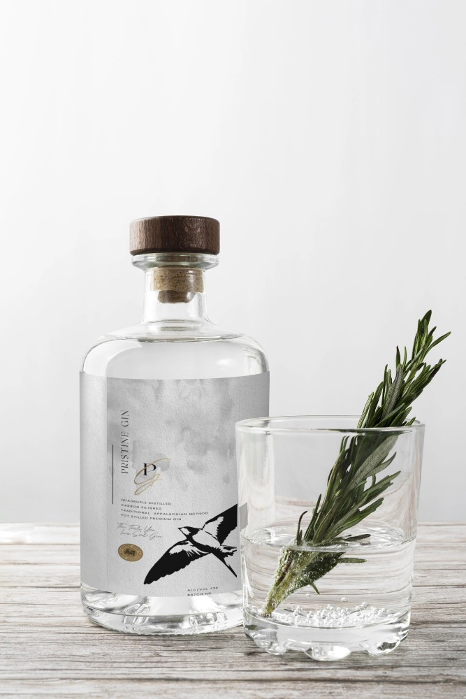 Copper Still Craft Distillery product label featuring TLDC’s gold foil and premium typography.